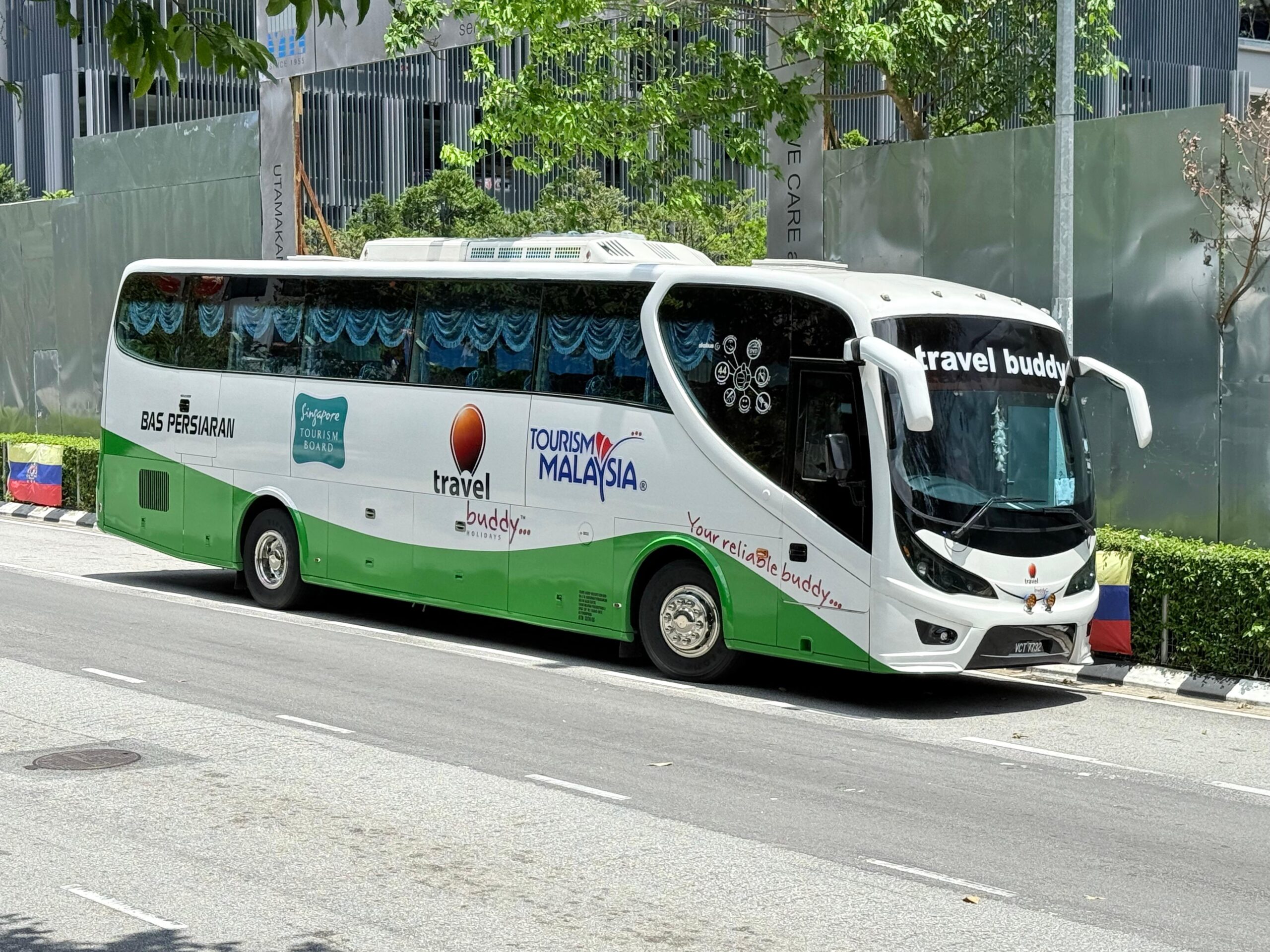 Travel group boarding bus coordinated by a B2B travel team