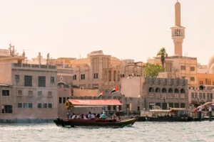 Happy budget travelers with backpacks exploring a scenic destination
