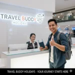 Traveler smiling at agency counter with Travel Buddy Holidays logo visible